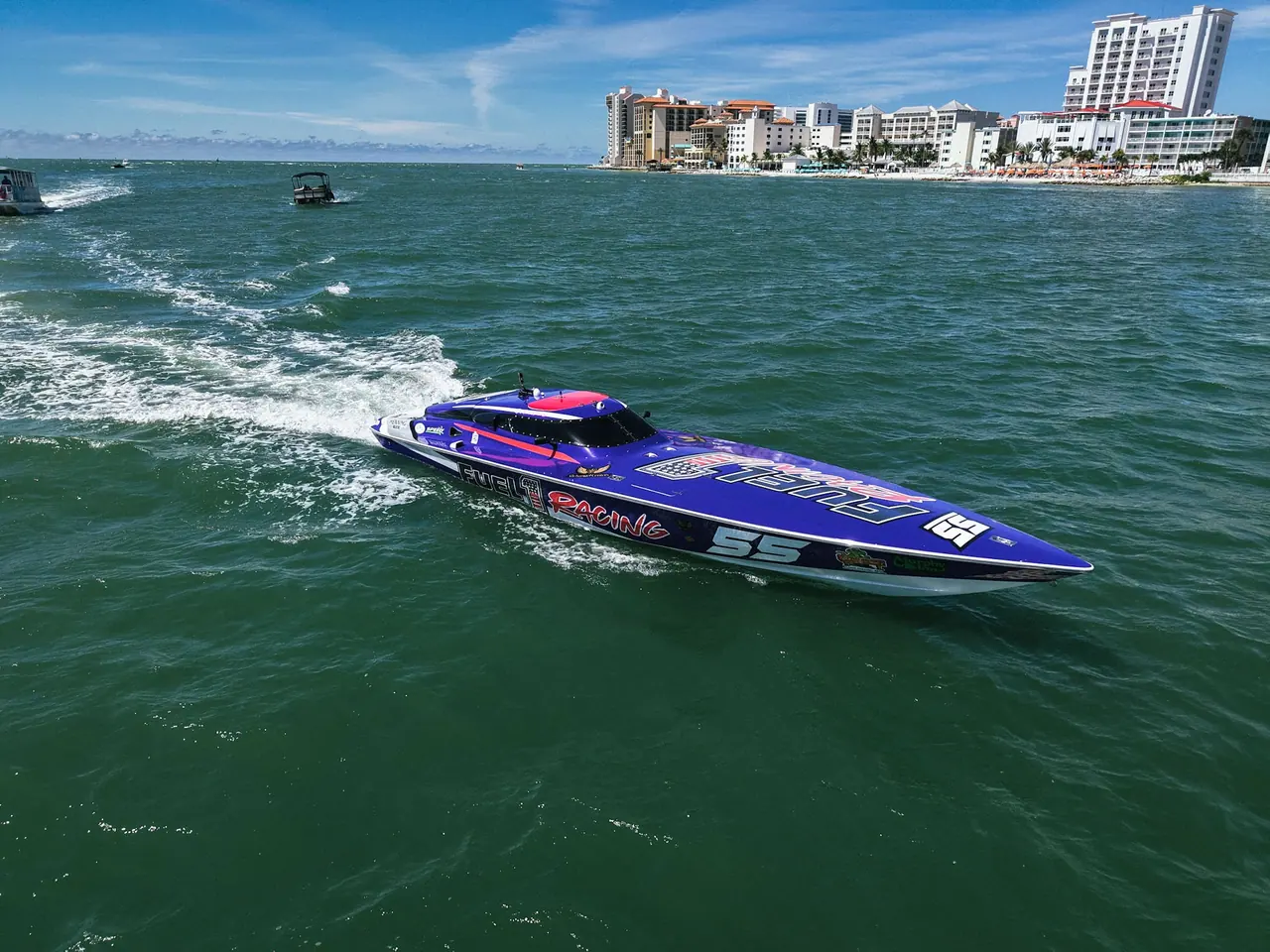 The #55 Phantom turning along Clearwater Beach with spray behind it