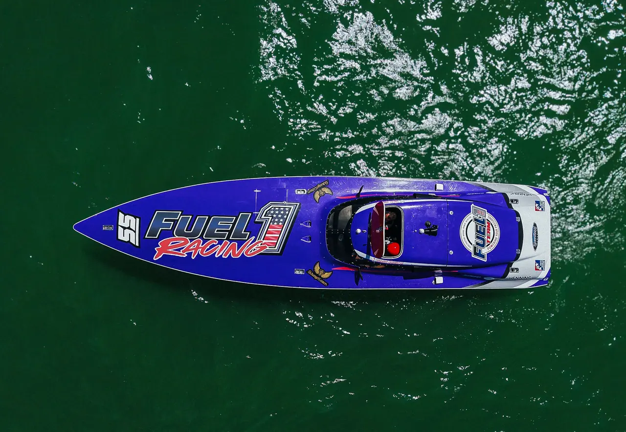 Overhead drone view of the #55 Fuel 1 Racing Phantom, number 55 and logo on the deck