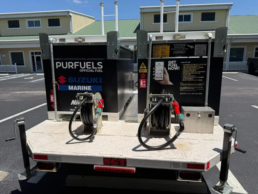 Two PurFuels MicroStation units side by side on a trailer with hoses and nozzles