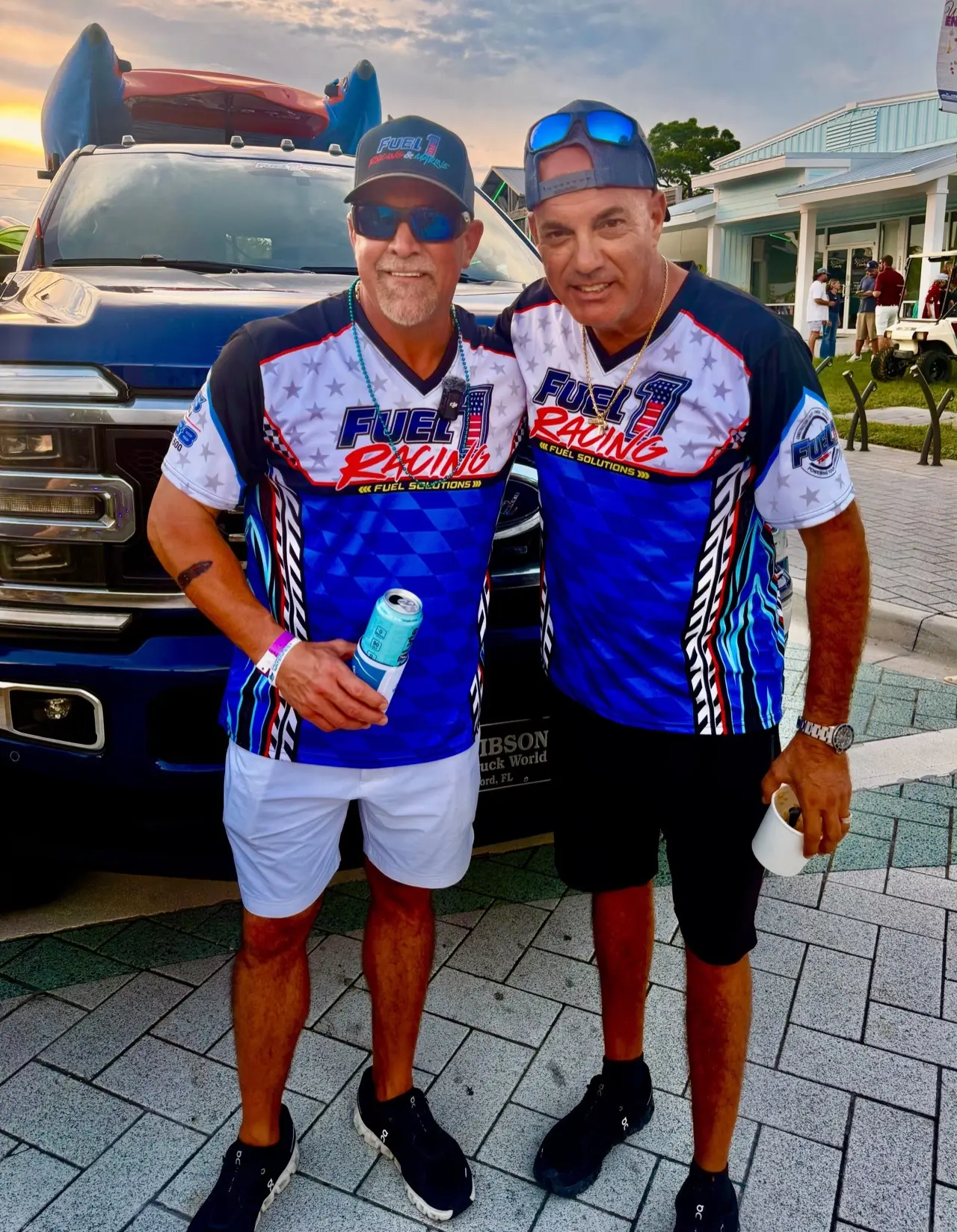 Mike Geraud and Damon of Fuel 1 Team Racing in Fuel 1 Racing jerseys