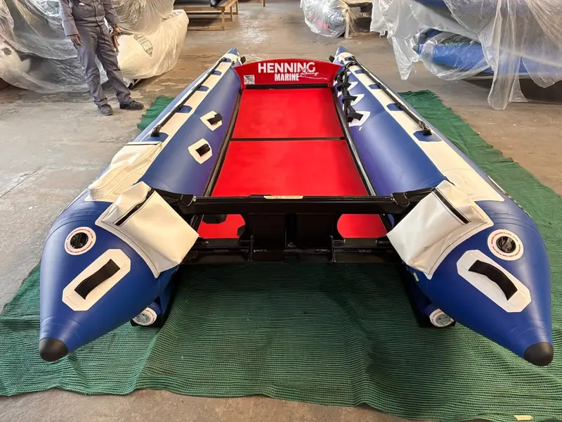 The Fuel 1 Team ThunderCat from the bow, its red deck between blue and white sponsons